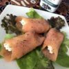 Involtini di salmone affumicato e caprino con pepe al whisky