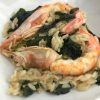 Risotto con cavolo nero e gamberoni flambè